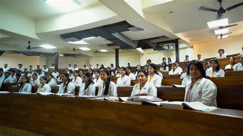 MBBS students attending medical lectures in classroom setting