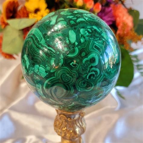 Malachite Ball: The Enchanting Stone of Transformation