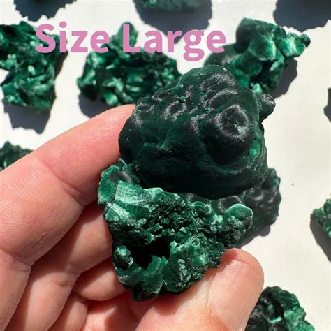 Malachite Crystals: A Tapestry of Healing and Empowerment