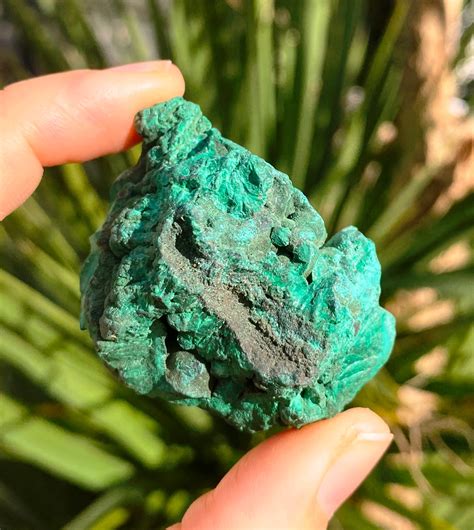 Malachite Crystals: Unraveling the Enchanting Emerald of Transformation