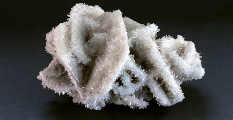 Manganoan Calcite: A Gemstone with Mystical Beauty and Industrial Significance