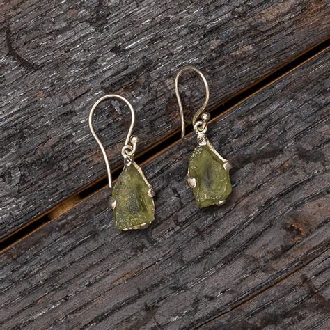 Moldavite Earrings: A Journey of Transformation and Empowerment