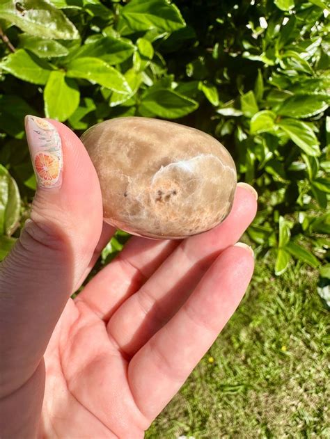 Moonstone Palm Stone: An Enchanting Ally for Personal Growth and Emotional Balance