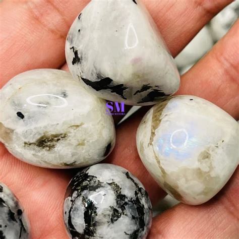 Moonstone Tumbled: Shimmering Embrace of Lunar Radiance