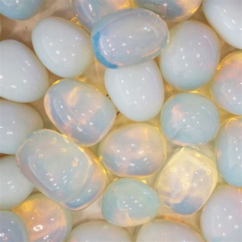 Moonstone Tumbled: Shimmering Reflections of Lunar Energy