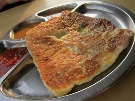 Mr. and Mrs. Mohgan's Super Crispy Roti Prata: A Culinary Masterpiece