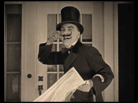 Mustachioed Origins: The Silent Film Era