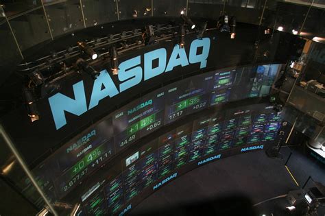 Nasdaq Powers Ahead as Dow, S&P 500 Tame 2025 Expectations