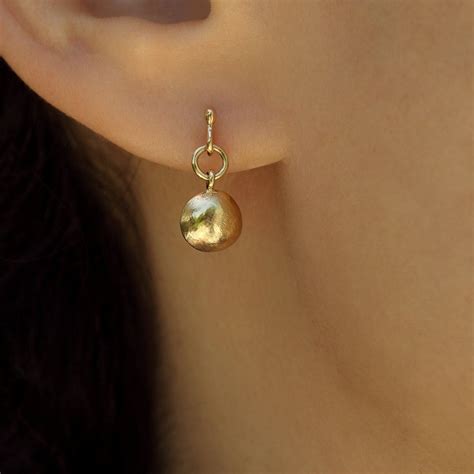 Navigating the World of Small Gold Earrings