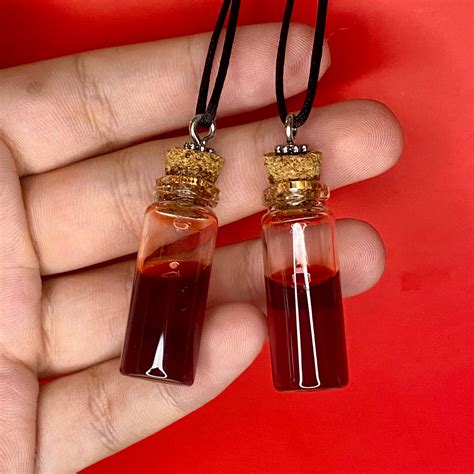 Necklace vials