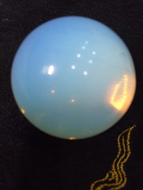 Opalite Sphere: The Mystical Orb that Enchants and Enriches