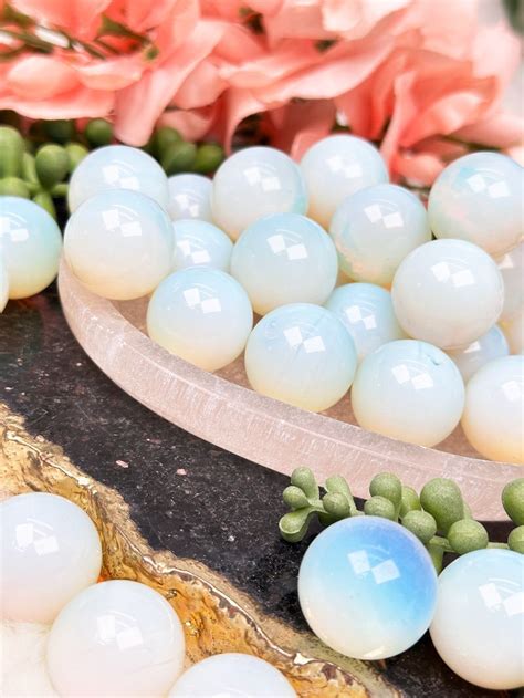 Opalite Sphere: Unveil the Enchanting World of Glassy Goodness