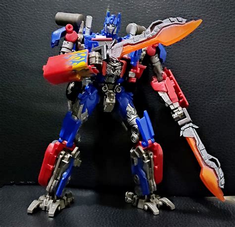 Optimus Prime with Sword: A Formidable Force in the Transformers Universe