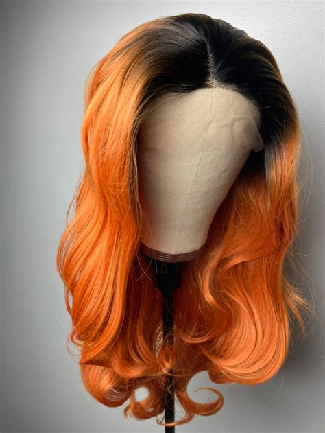 Orange and Black Wigs: A Vibrant and Enigmatic Hairpiece