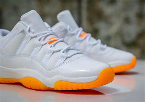 Orange and White Jordan 11s