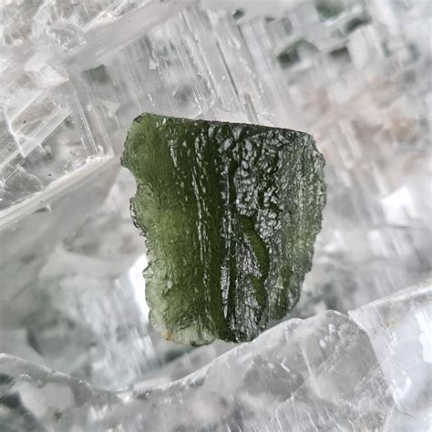 Origin and Formation of Moldavite: A Celestial Genesis