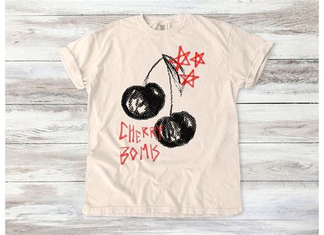 Origins and Evolution of the Cherry Bomb T-Shirt