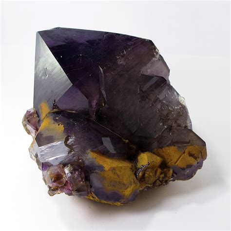 Origins and Formation of Smoky Amethyst Quartz