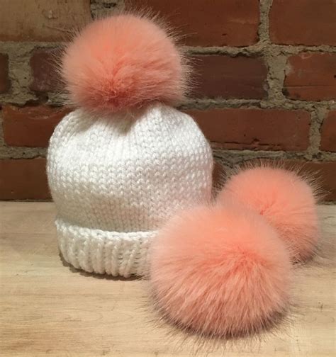 Pom Poms: A Chic and Practical Adornment for Hats