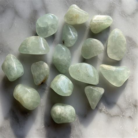 Prehnite Tumbled: A Gemstone of Inner Peace and Transformation