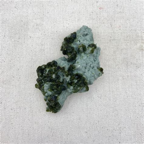 Prehnite on Epidote: A Synergistic Fusion