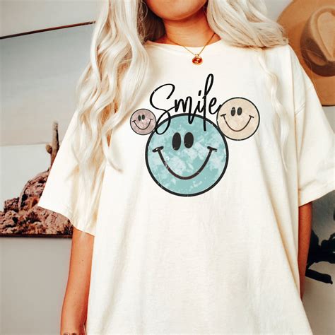 Prep up Your Wardrobe with the Preppy Smiley Face T-Shirt: A Timeless Fashion Statement