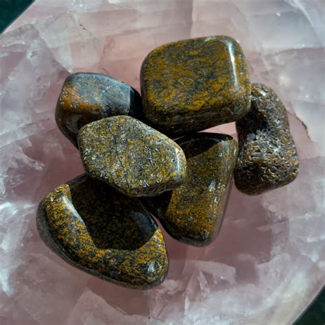 Properties of Blue Goldstone: A Cosmic Stone of Dreams and Serenity