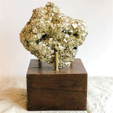 Pyrite Crystals: Unlocking the Radiant Treasures of Well-Being and Wealth