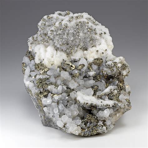 Pyrite on Quartz: A Golden Symphony in Nature