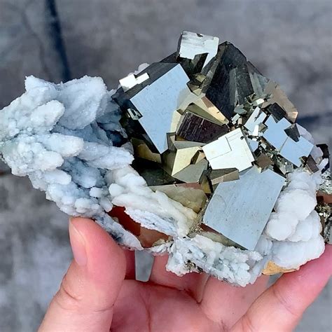 Pyrite on Quartz: A Treasured Combination in the Realm of Minerals