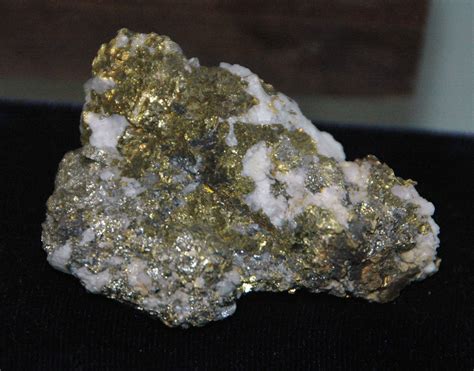 Pyrite on Quartz: Nature's Golden Embrace