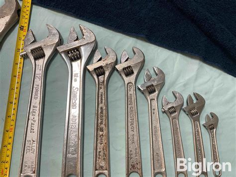 Regular crescent wrenches