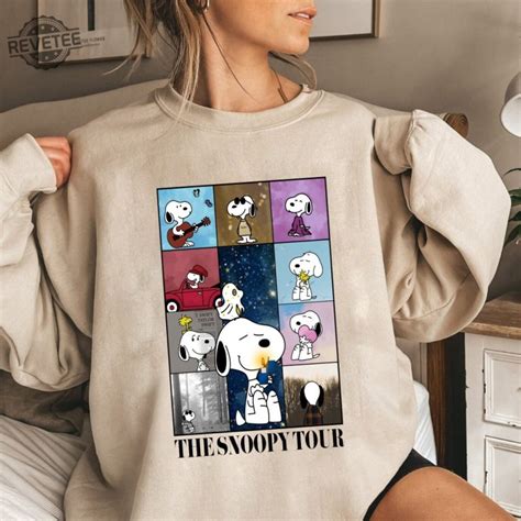 Relive the cherished memories of the beloved beagle with the Snoopy Eras Tour Sweatshirt.