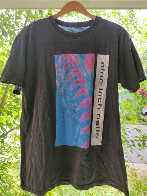 Revive the Grunge Era with Iconic NIN Vintage Tees