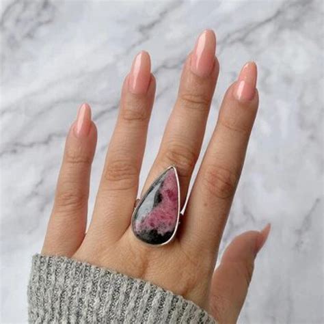 Rhodonite Jewelry: Unveil the Enchanting Embrace of Love and Healing