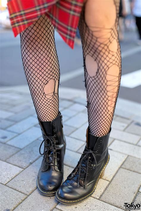 Ripped Fishnet Stockings: