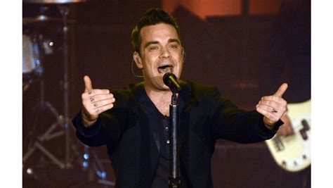 Robbie Williams: Unveiling the Musical Maestro's Extraordinary Journey