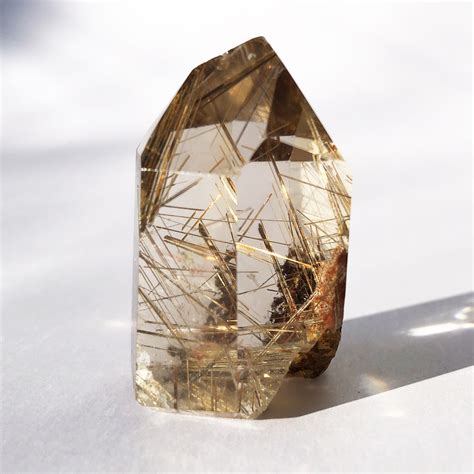 Rutilated Quartz Healing Properties: Uncover the Golden Rutile Energy Within