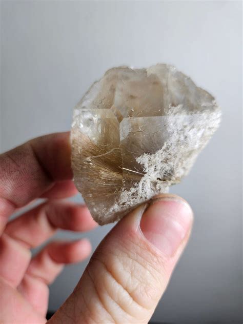 Rutilated Quartz Raw: Uncover the Mystical Gem with Inclusions of Golden Light