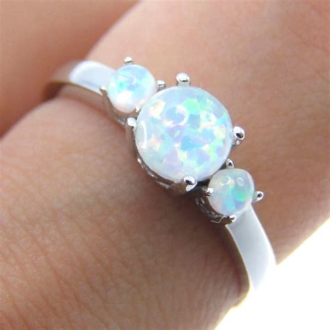 Shimmering Masterpieces: The Magic of Silver Opal Rings