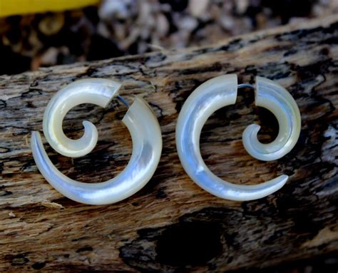 Small Gauge Earrings: Delicately Enhancing Your Style