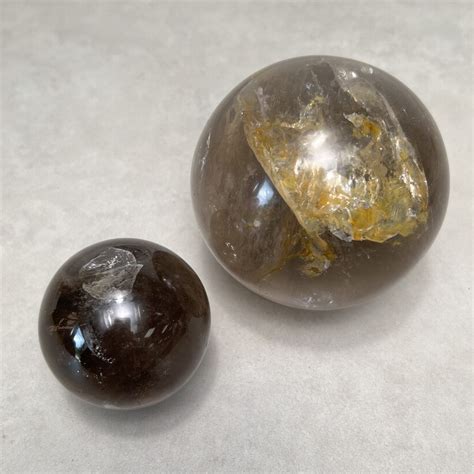 Smoky Quartz Spheres: Unveil the Enigmatic Charm of Earth's Mysterious Stone