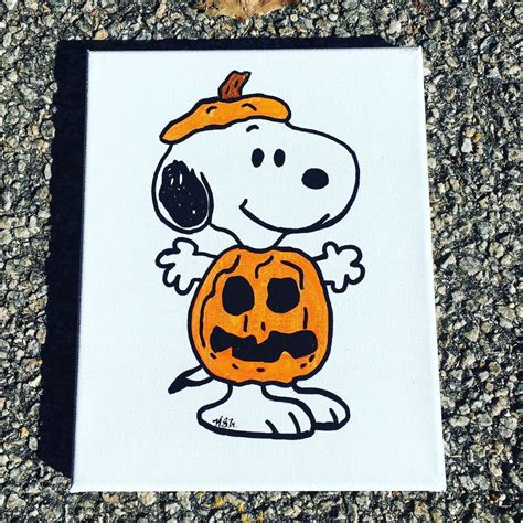 Snoopy in a Pumpkin Costume: