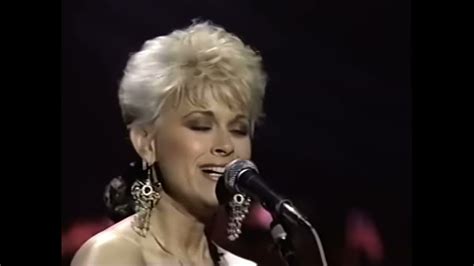 Step Into Style with Lorrie Morgan's "Out of Your Shoes"