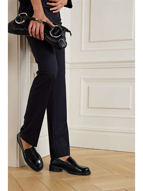 Step into Sophisticated Style: A Comprehensive Guide to Stuart Weitzman Loafers