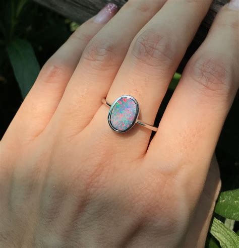 Sterling Silver Opal Rings: A Symphony of Iridescence and Elegance