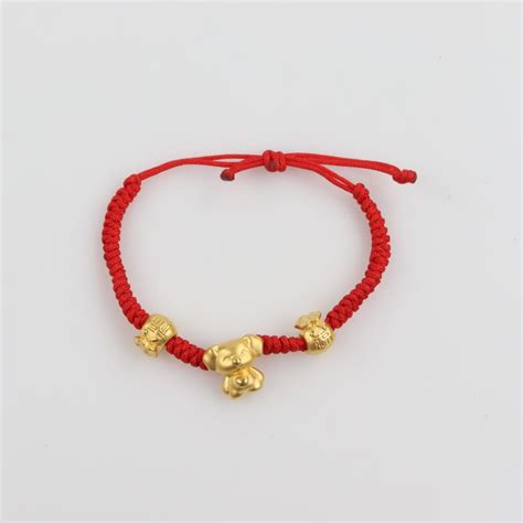 String Bracelet With Gold Charm In Skymall Catalog