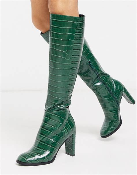 Strut in Style: Captivating the World with Green Knee High Boots