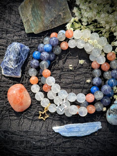 Sunstone and Moonstone: A Cosmic Dance of Energy and Emotion