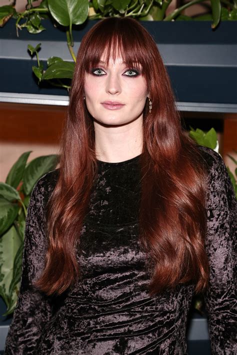 The Allure of Red Hair with Bangs